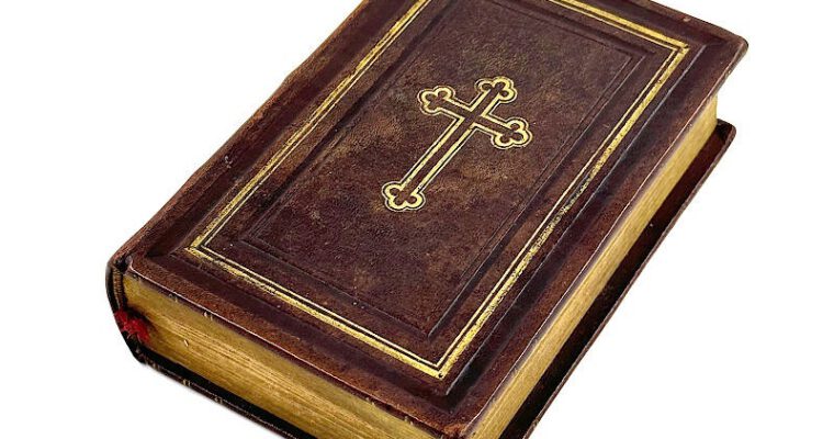 Religious book with a secret compartment with private nudes